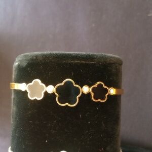Gold and black bracelet